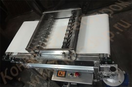 Машина для ножевой резки раскатанных пластов теста на заготовки изделий различной конфигурации